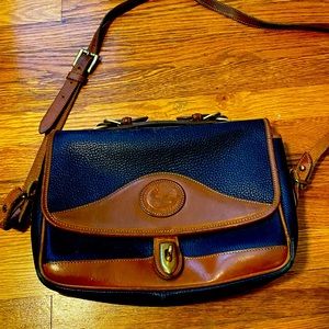 Beautiful vintage Dooney and Bourke purse. 100% leather. In great condition.